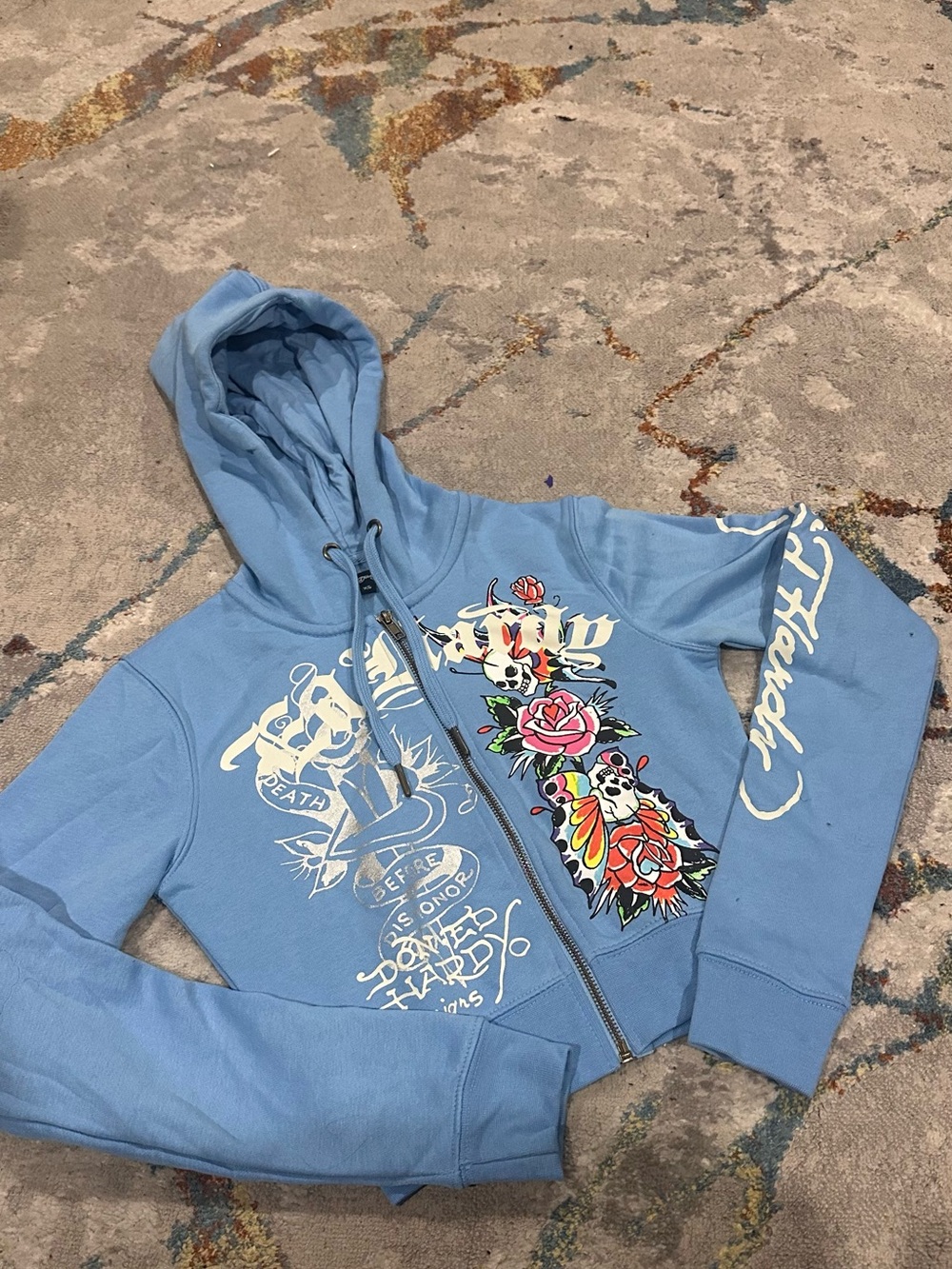 Women’s Light Blue Graphic Zip-Up Hoodie with Floral & Skull Art